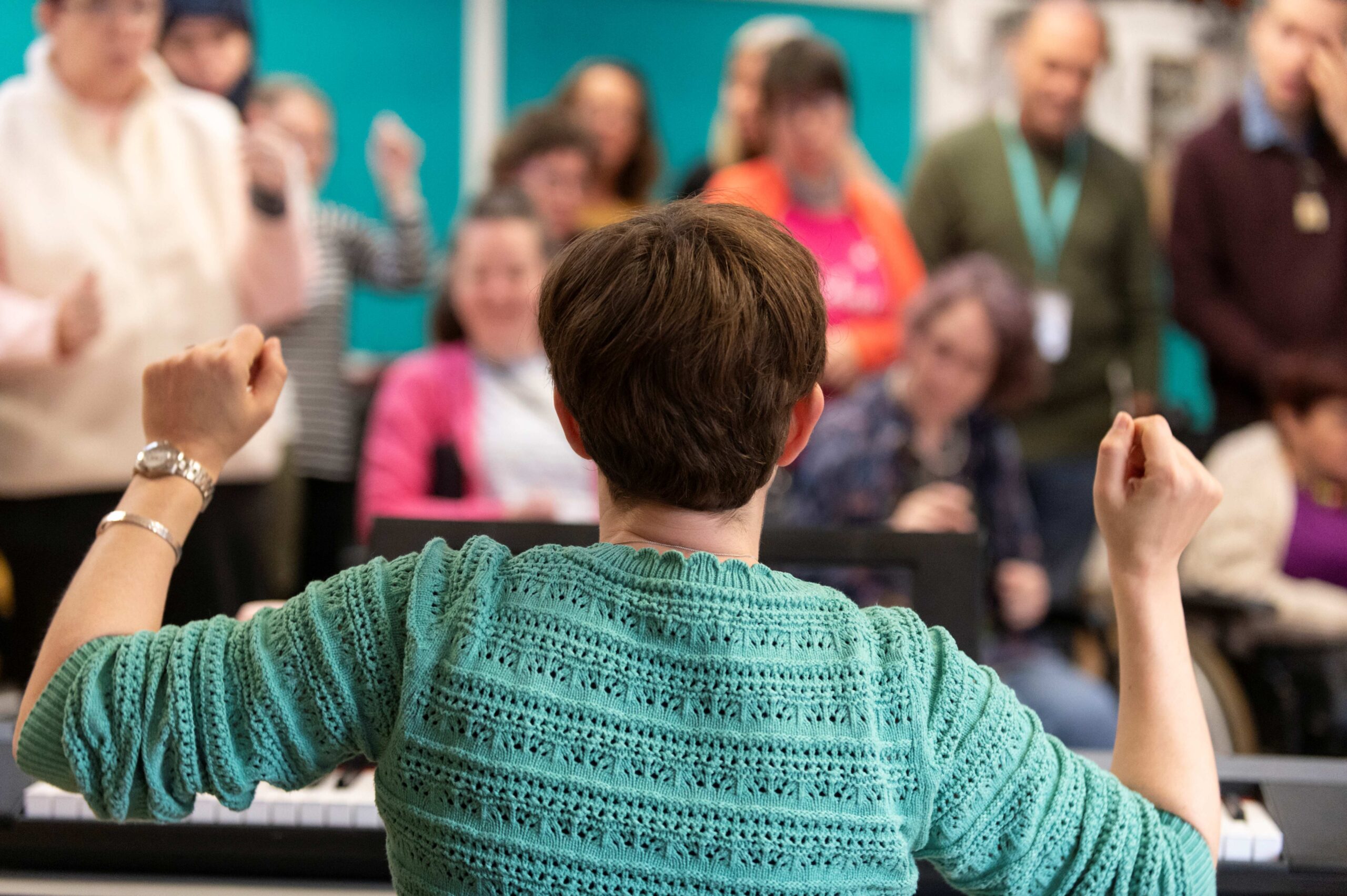 Phoebe Gaydon conducting The Meath Choir in rehearsals.